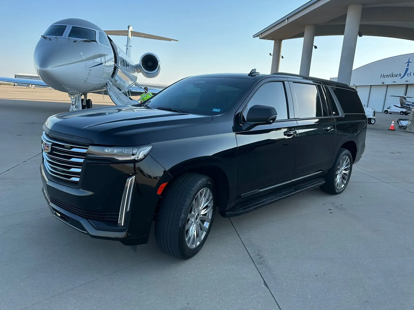 Executive SUV at private aviation facility