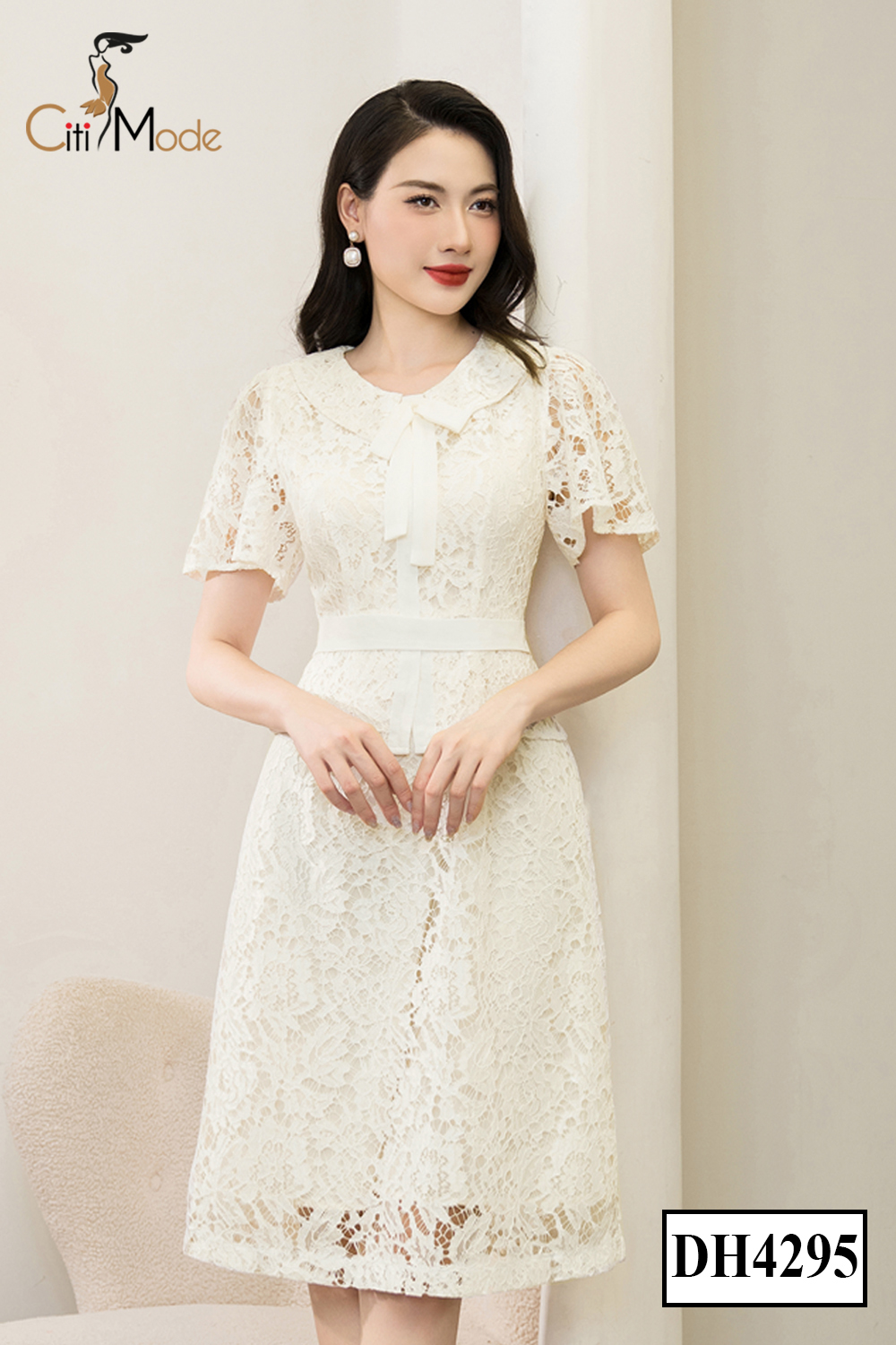 Đầm xòe ren kem peplum