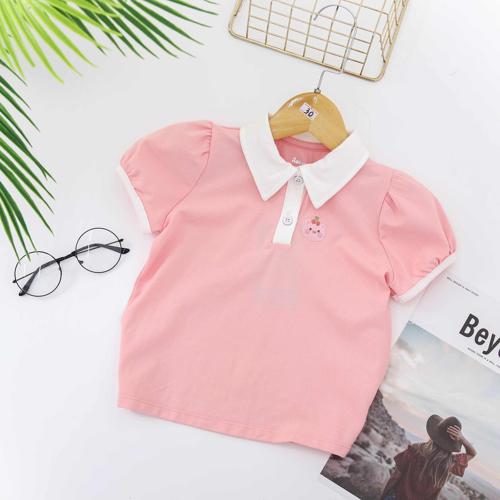 Áo polo thêu ngực tay bồng