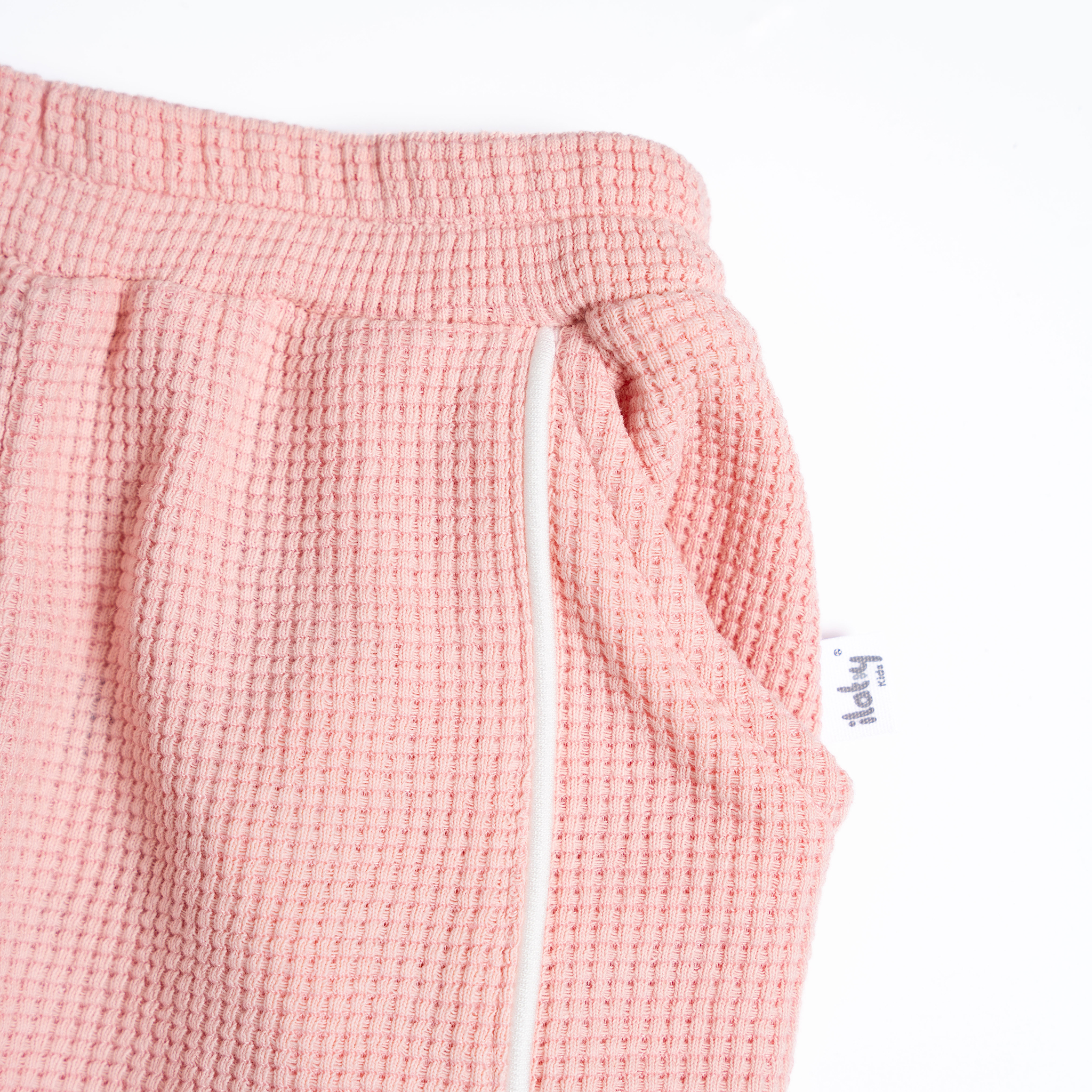 Quần bé gái vải tổ ong phối đường lé_thumbnail_1