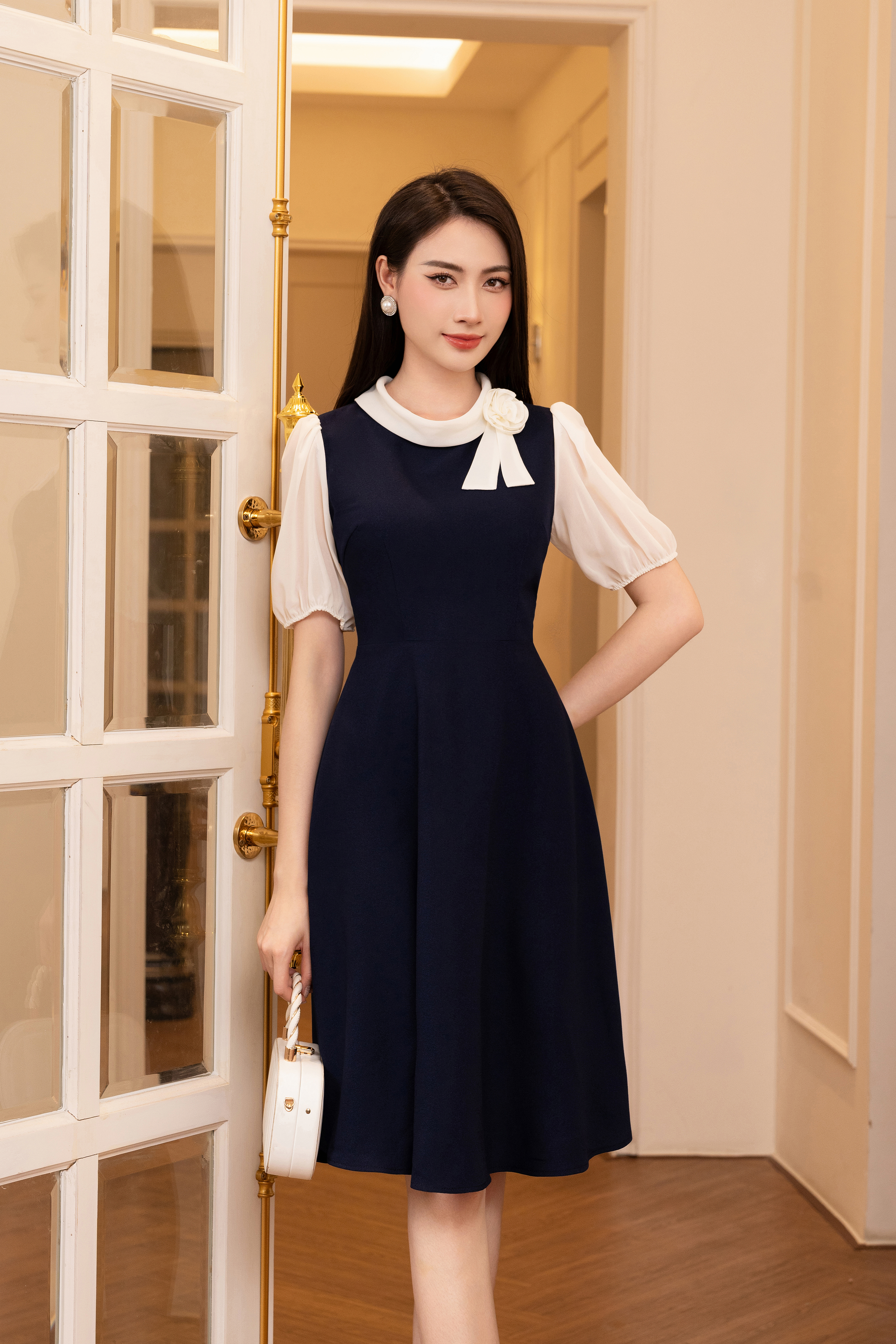 Đầm xòe xanh than 1 màu phối tay voan chi phông nơ cổ_thumbnail_0