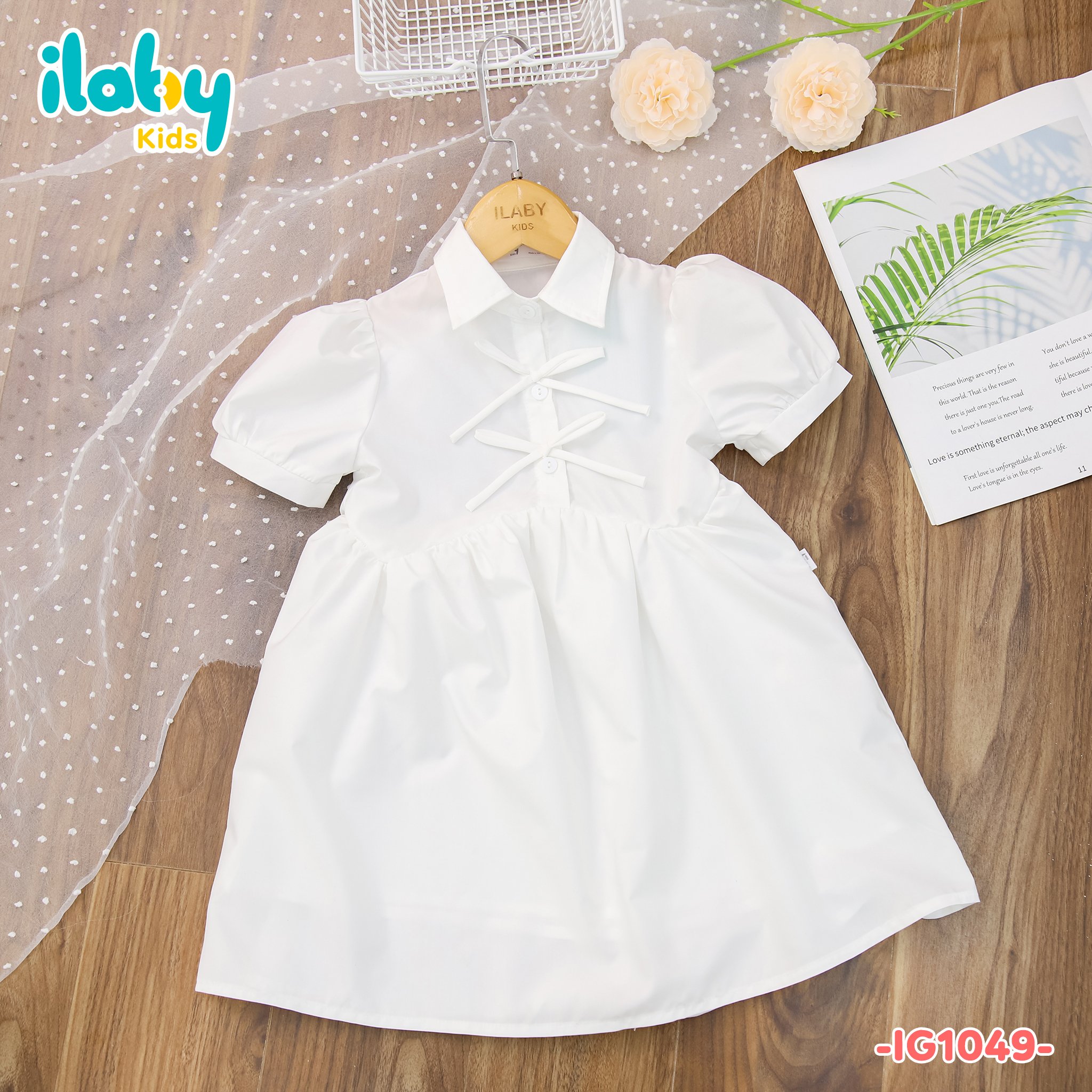 Váy sơ mi hai nơ đính