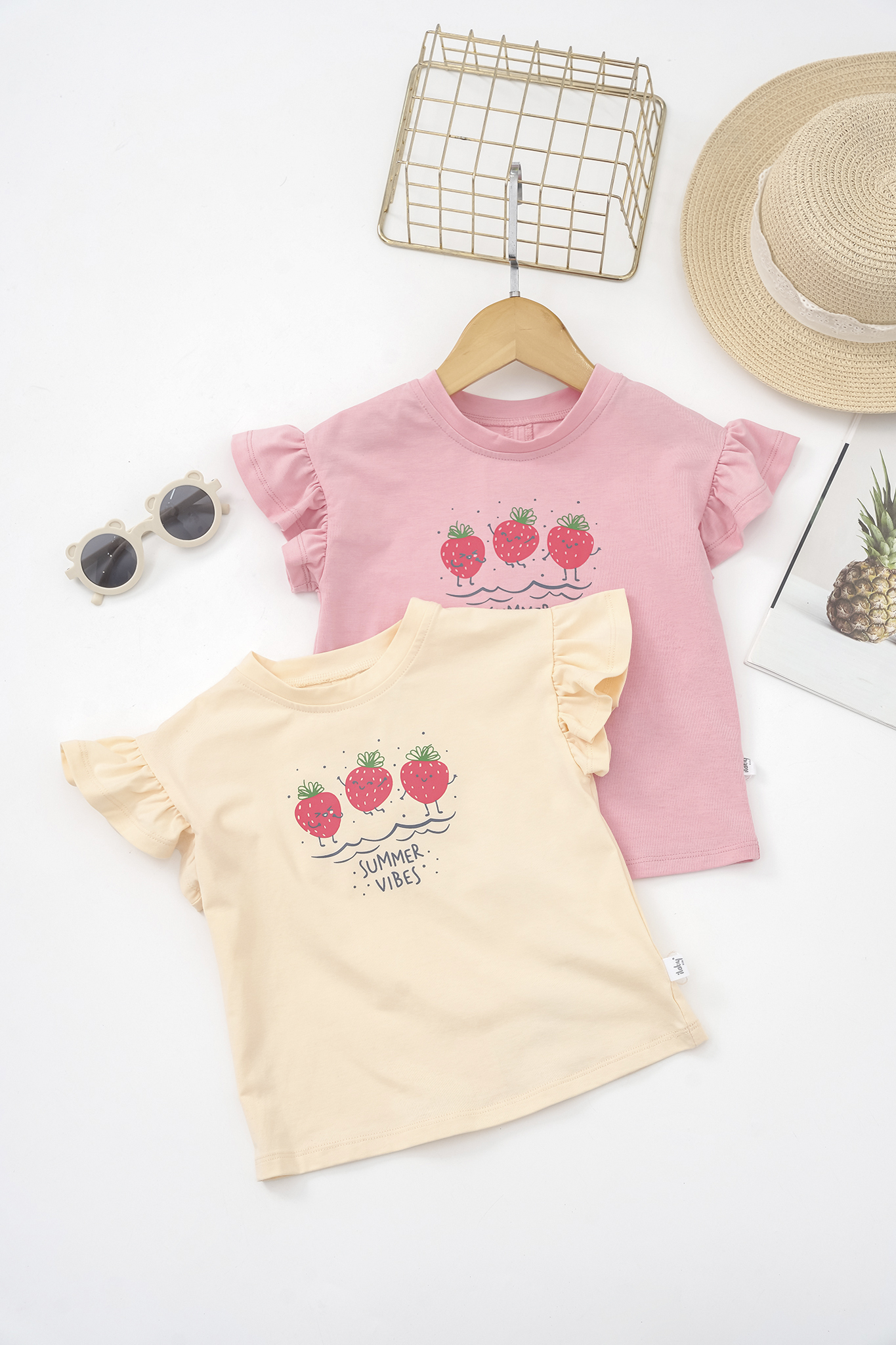 Áo thun in hình phối nơ sau lưng_thumbnail_0