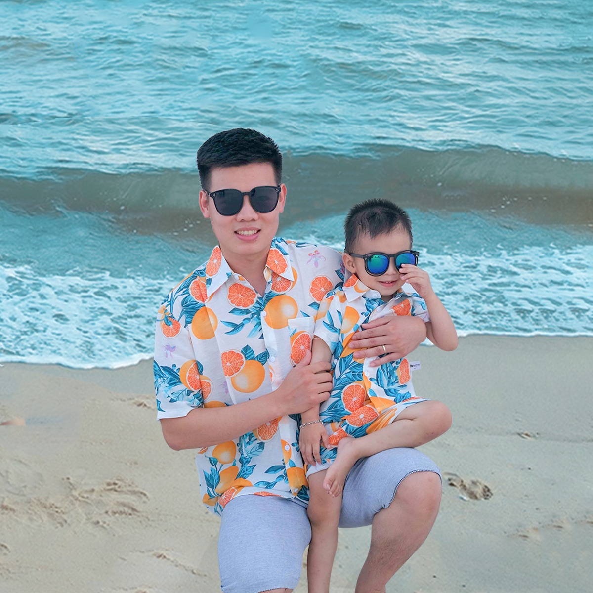 Áo sơ mi đi biển cho nam nữ MAGICKIDS đồng phục đi biển gia đình chất tơ đũi thoáng mát họa tiết hoa lá AO22034